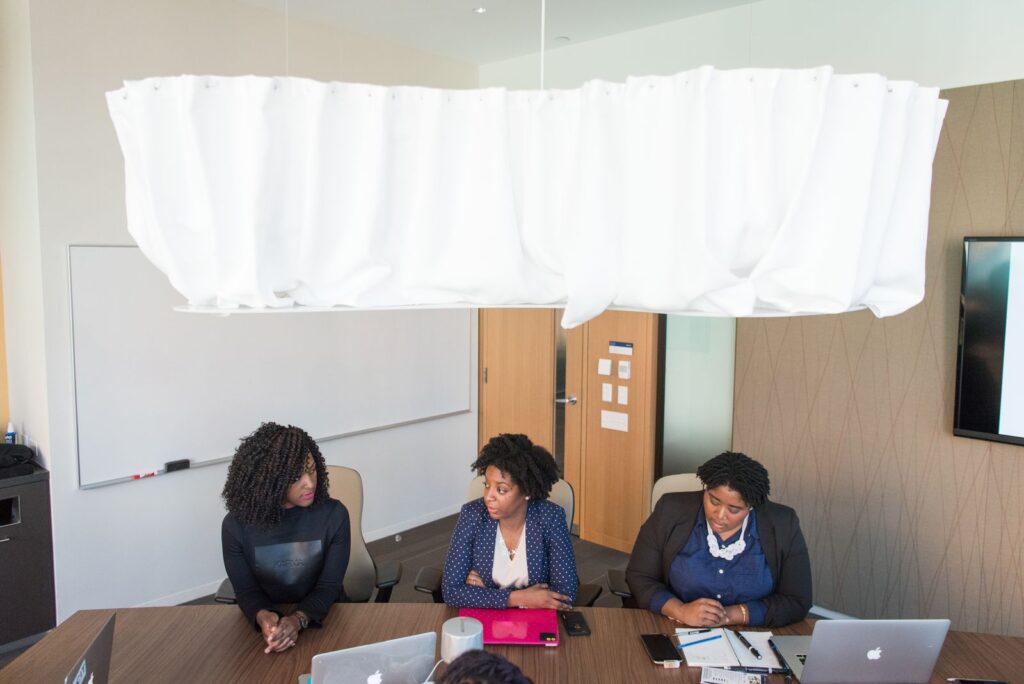 Board members reviewing corporate governance matters in a meeting