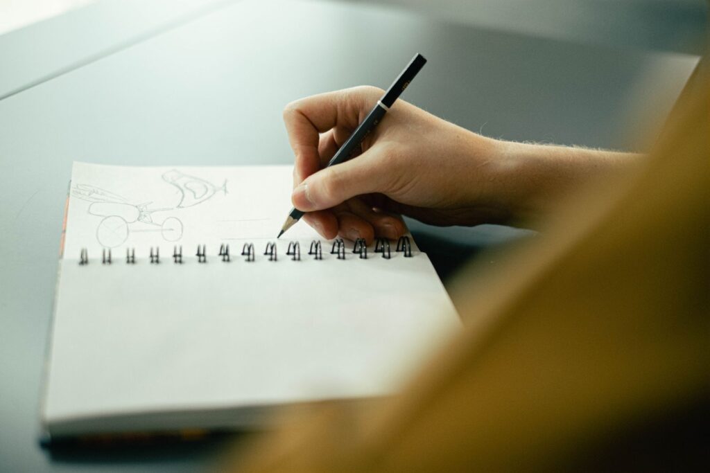 Sketching a brand mark, representing the identity worth protecting through trademark registration